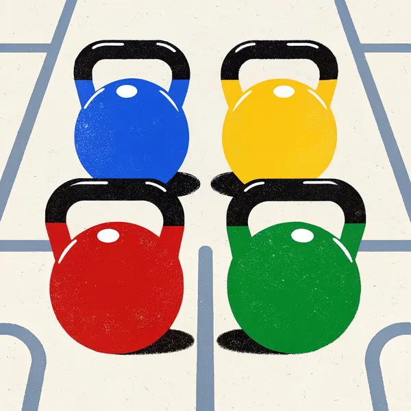 Four bumper plates leaning together like teammates