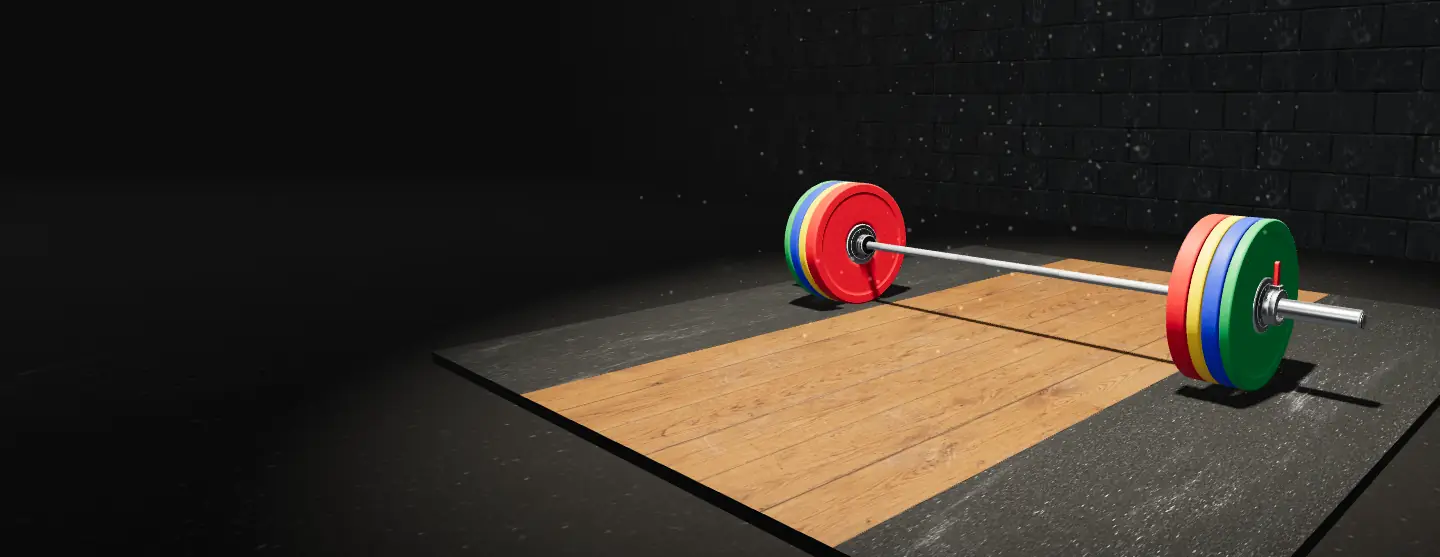 A barbell loaded with red, yellow, blue and green plates on a lifting platform, lit by a camera flash
