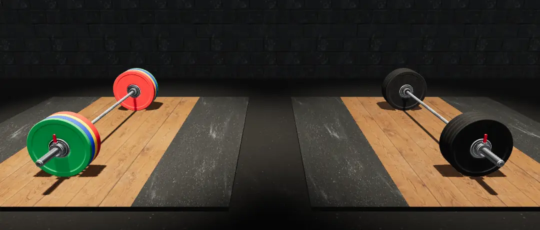 Two lifting platforms side by side, each with a loaded barbell: one with red, yellow, blue and green plates, one with plain black plates